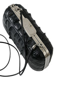 Bolsa Balenciaga preta em pele exótica, modelo clutch de ombro a tiracolo.