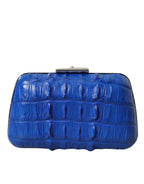 Bolsa Balenciaga azul em pele exótica, modelo clutch de ombro a tiracolo.