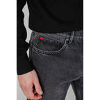 Calça de ganga Hugo Boss preta em algodão com modelagem descontraída.